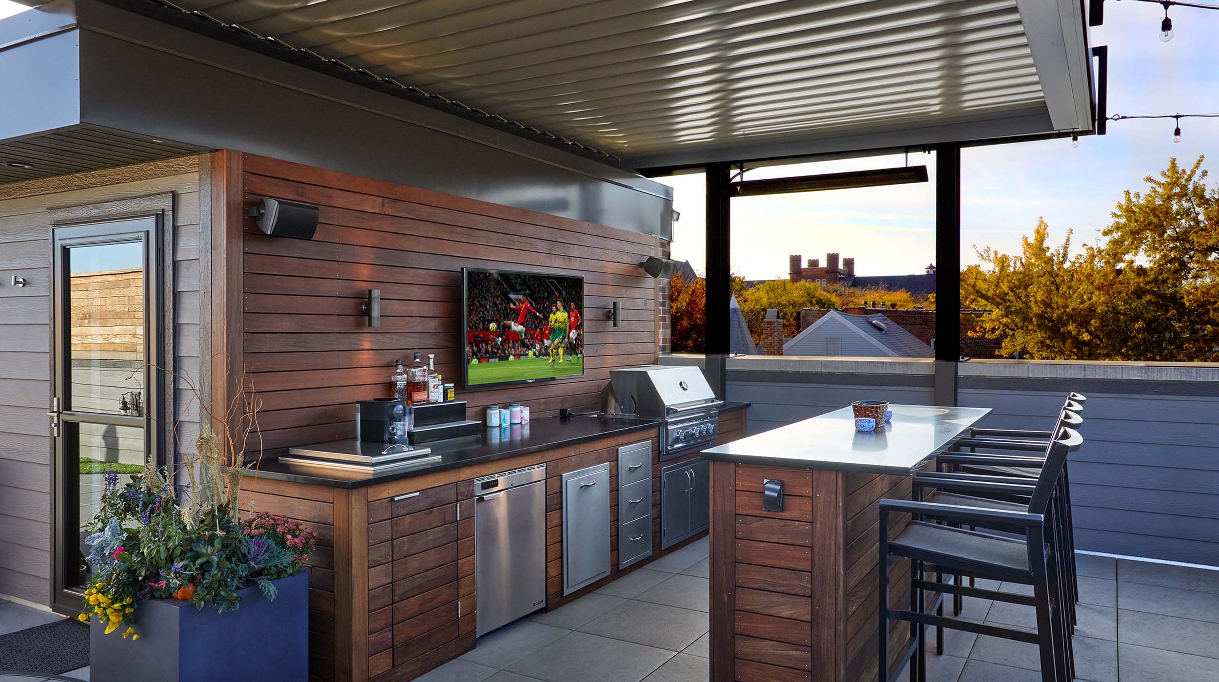 Rooftop deck, outdoor kitchen and modern touches turn historic